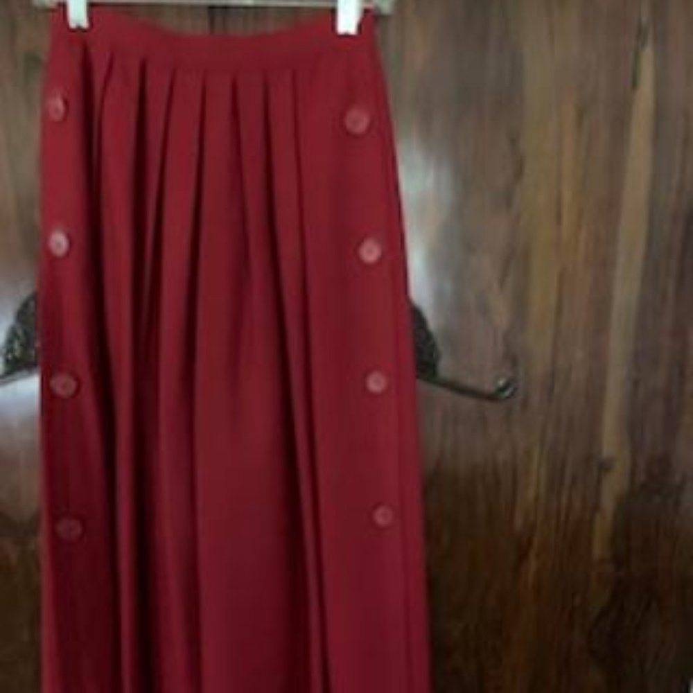 Akris 100% wool, brick-red skirt, size 6.
